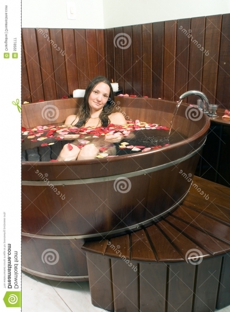 Awesome Wooden Bathtub Plans Woman At A Spa Soaking In A Large Wooden Bathtub Royalty Free